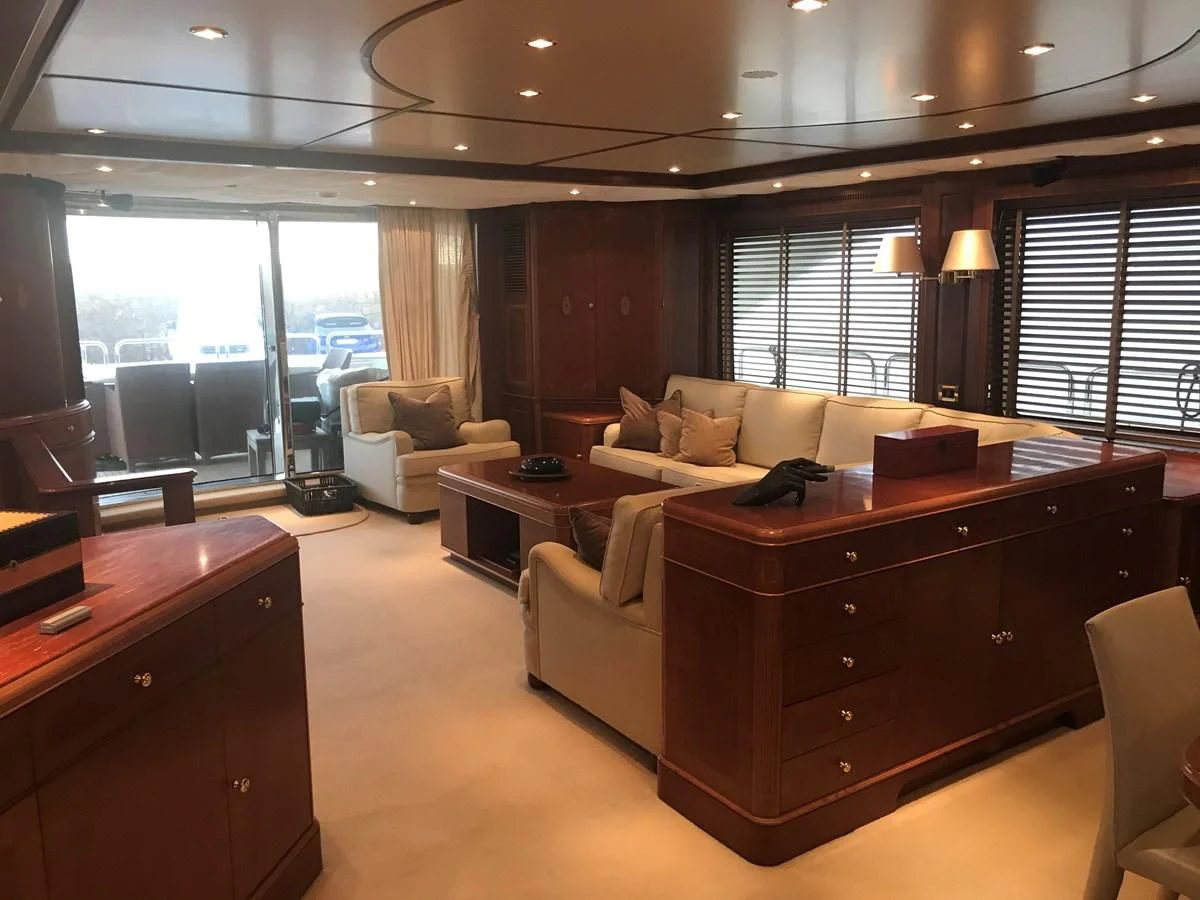 a living room with a large window aboard LADY ANN Yacht for Sale