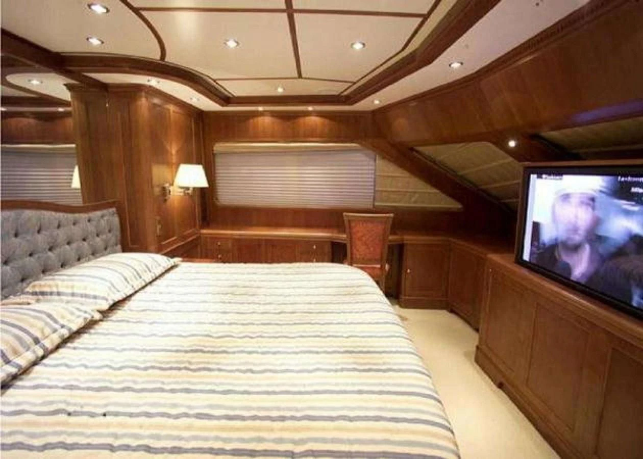 a bed in a room aboard LADY ANN Yacht for Sale