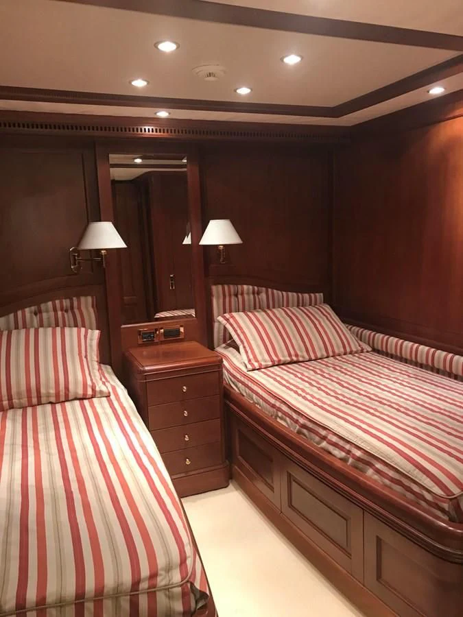 a room with a couple of beds aboard LADY ANN Yacht for Sale
