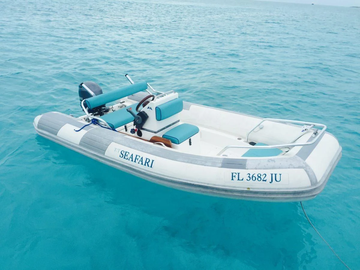 a white boat in the water aboard SEAFARI Yacht for Sale