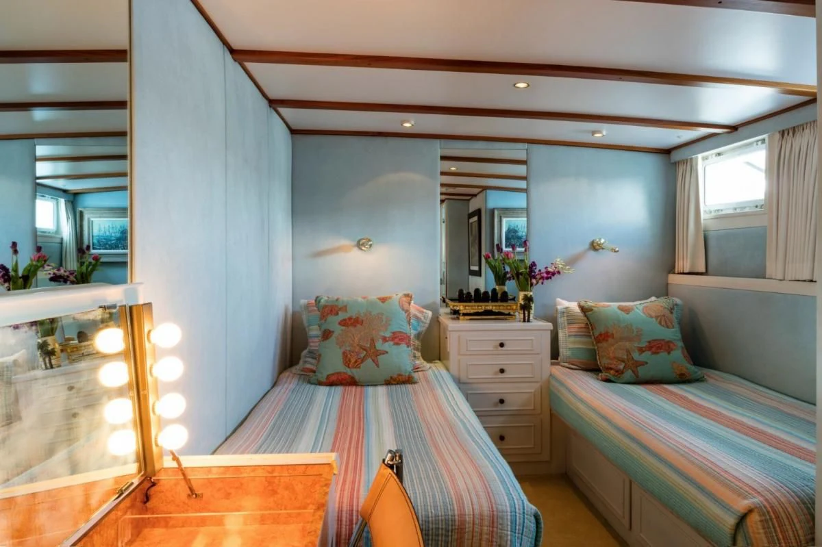 a couple of beds in a bedroom aboard SEAFARI Yacht for Sale