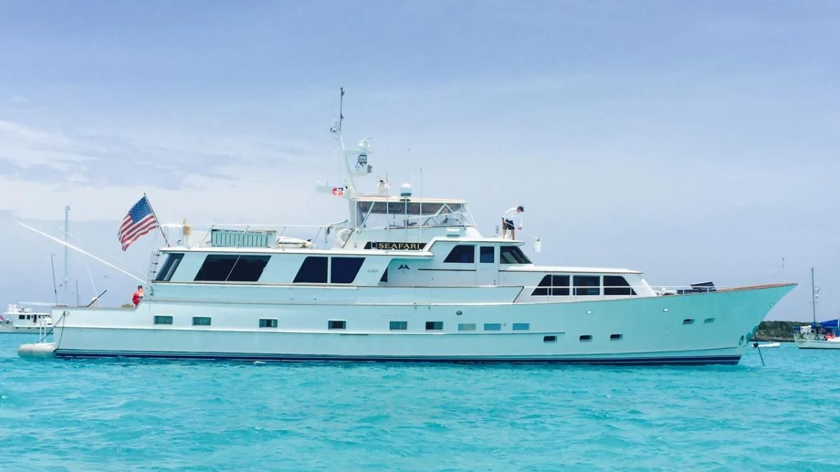a large white boat in the water aboard SEAFARI Yacht for Sale