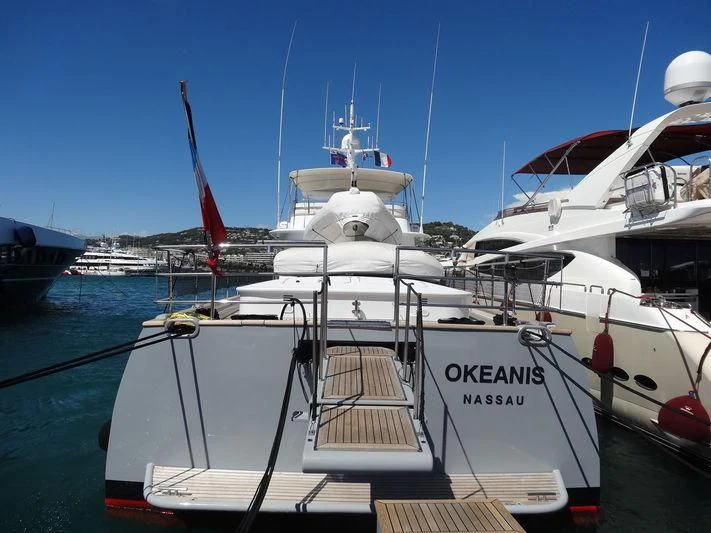 a group of boats are parked in the water aboard OKEANIS Yacht for Sale