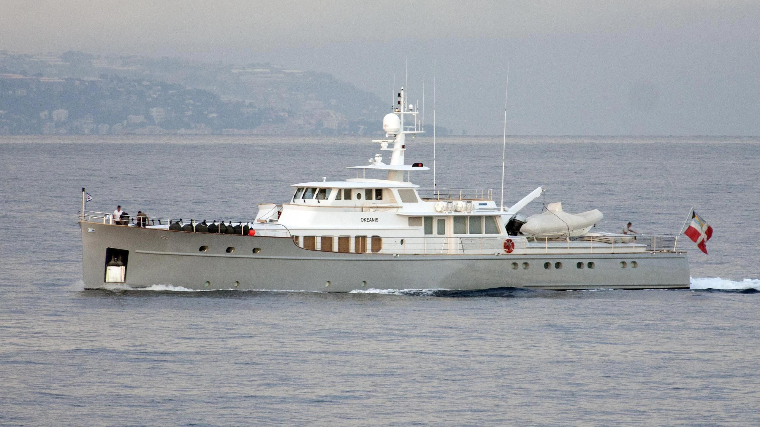 a large white boat with people on it aboard OKEANIS Yacht for Sale