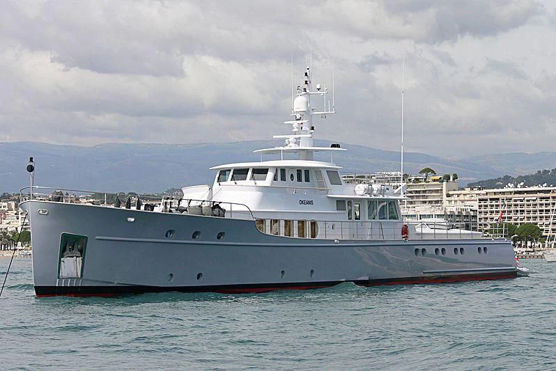 a large white boat in the water aboard OKEANIS Yacht for Sale
