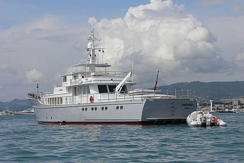 a large white boat in the water aboard OKEANIS Yacht for Sale