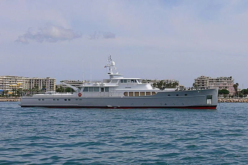 a large white boat in the water aboard OKEANIS Yacht for Sale