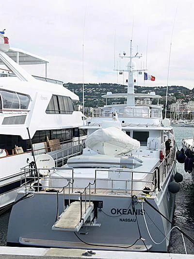 a couple of boats are parked in a harbor aboard OKEANIS Yacht for Sale