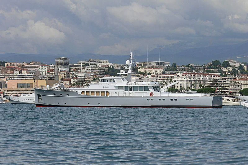 a large white boat in the water aboard OKEANIS Yacht for Sale
