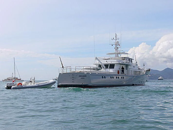 a couple of boats in the water aboard OKEANIS Yacht for Sale