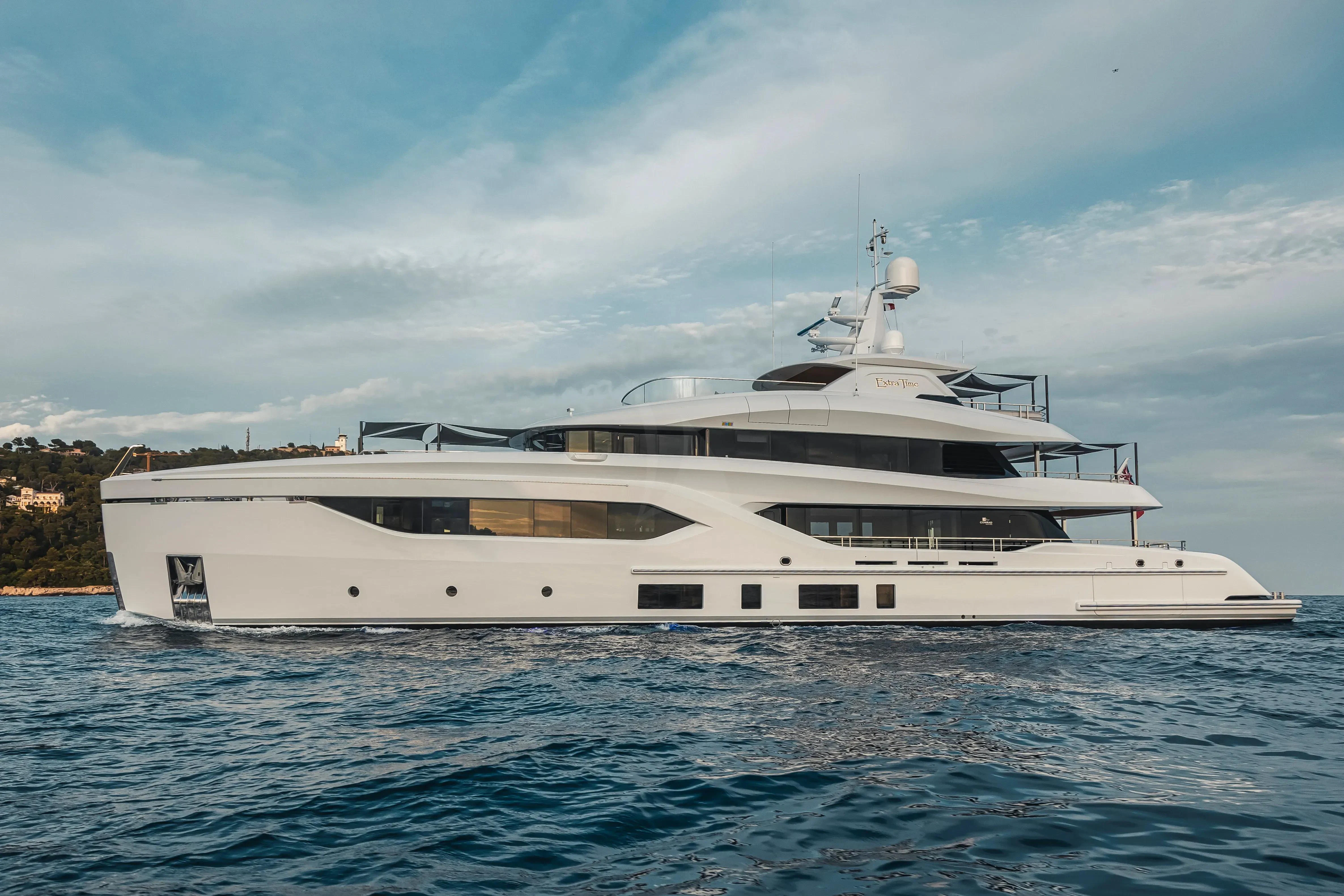 a large white yacht aboard EXTRA TIME Yacht for Sale