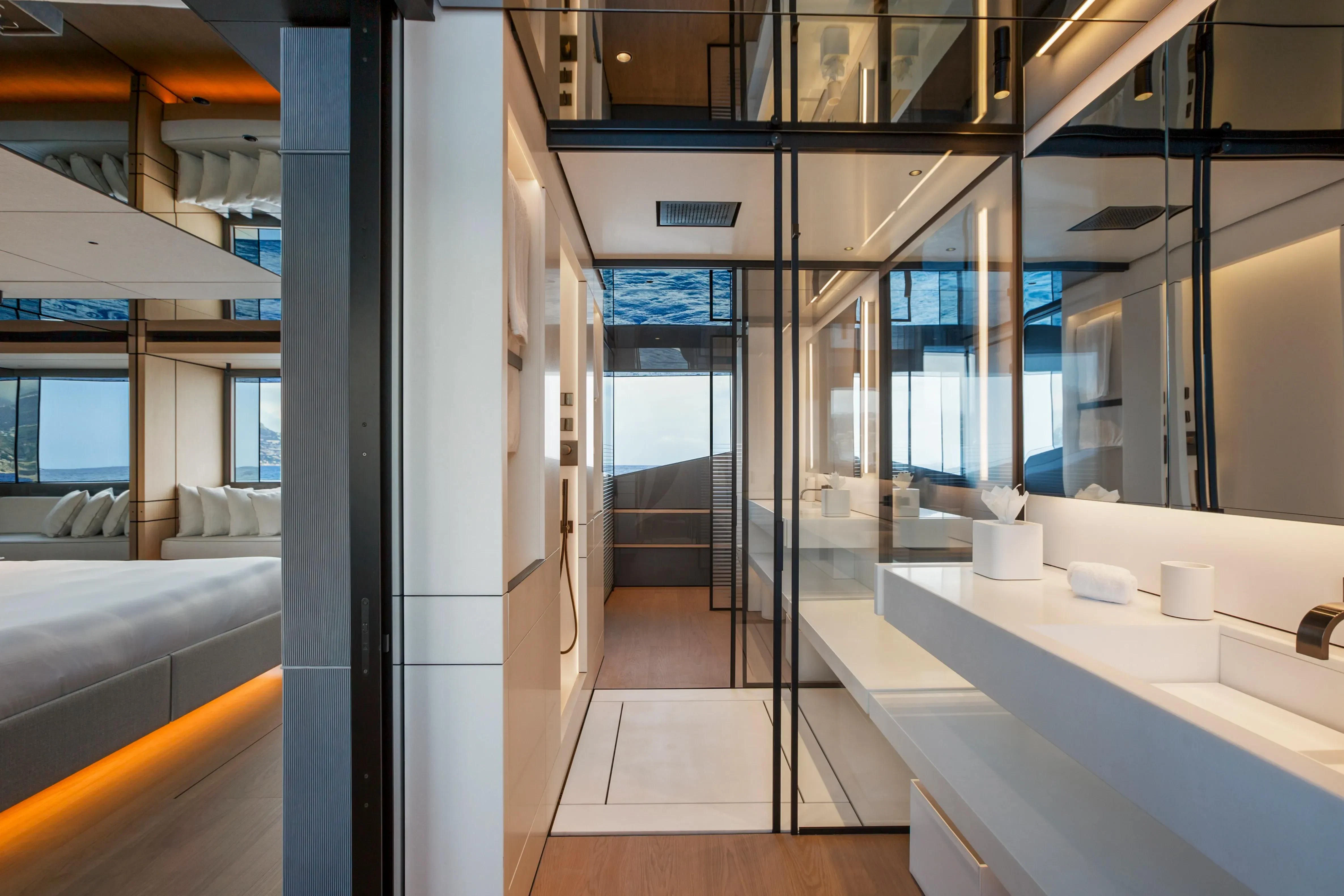 a room with glass walls and a glass door aboard EXTRA TIME Yacht for Sale
