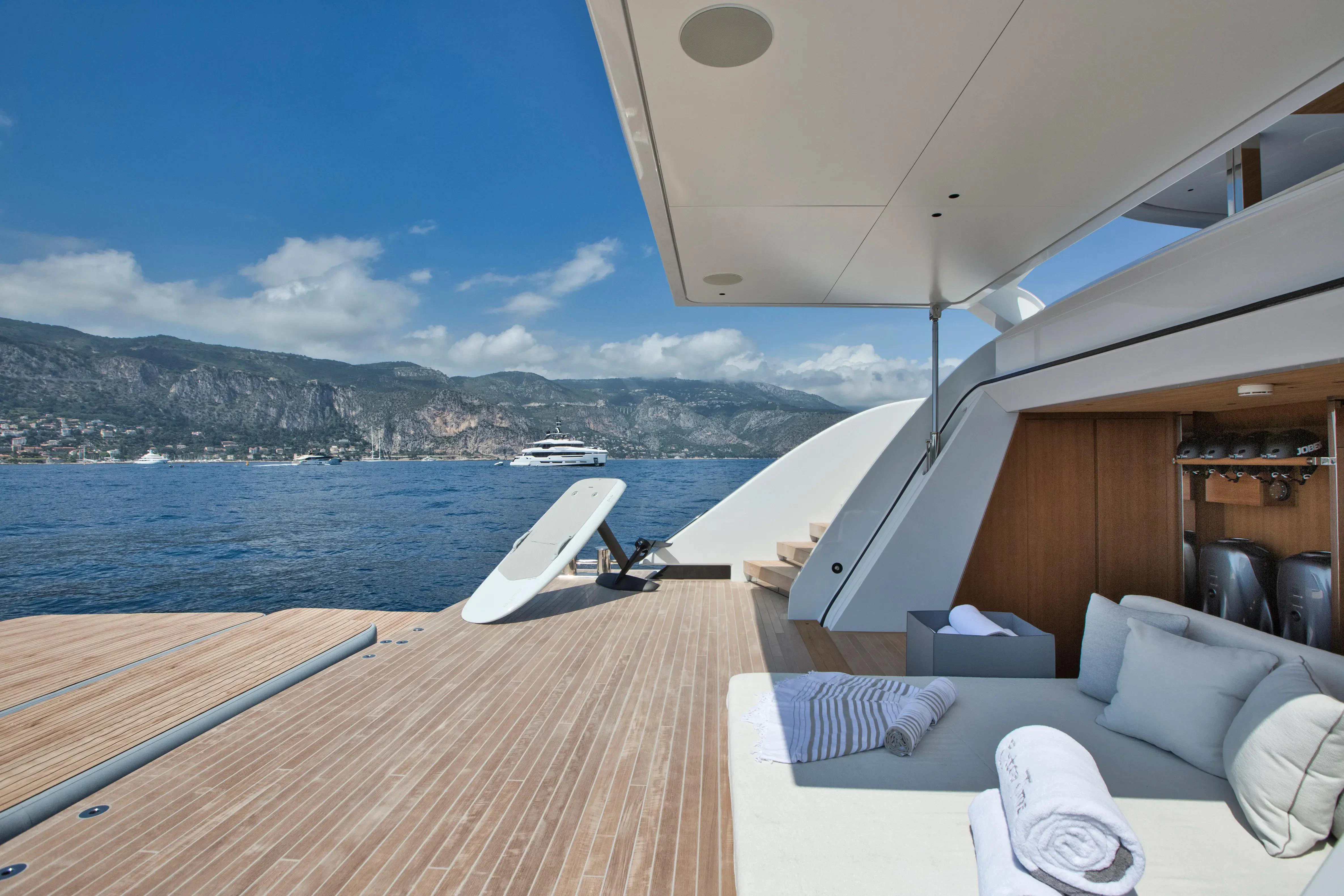 a boat on a deck aboard EXTRA TIME Yacht for Sale