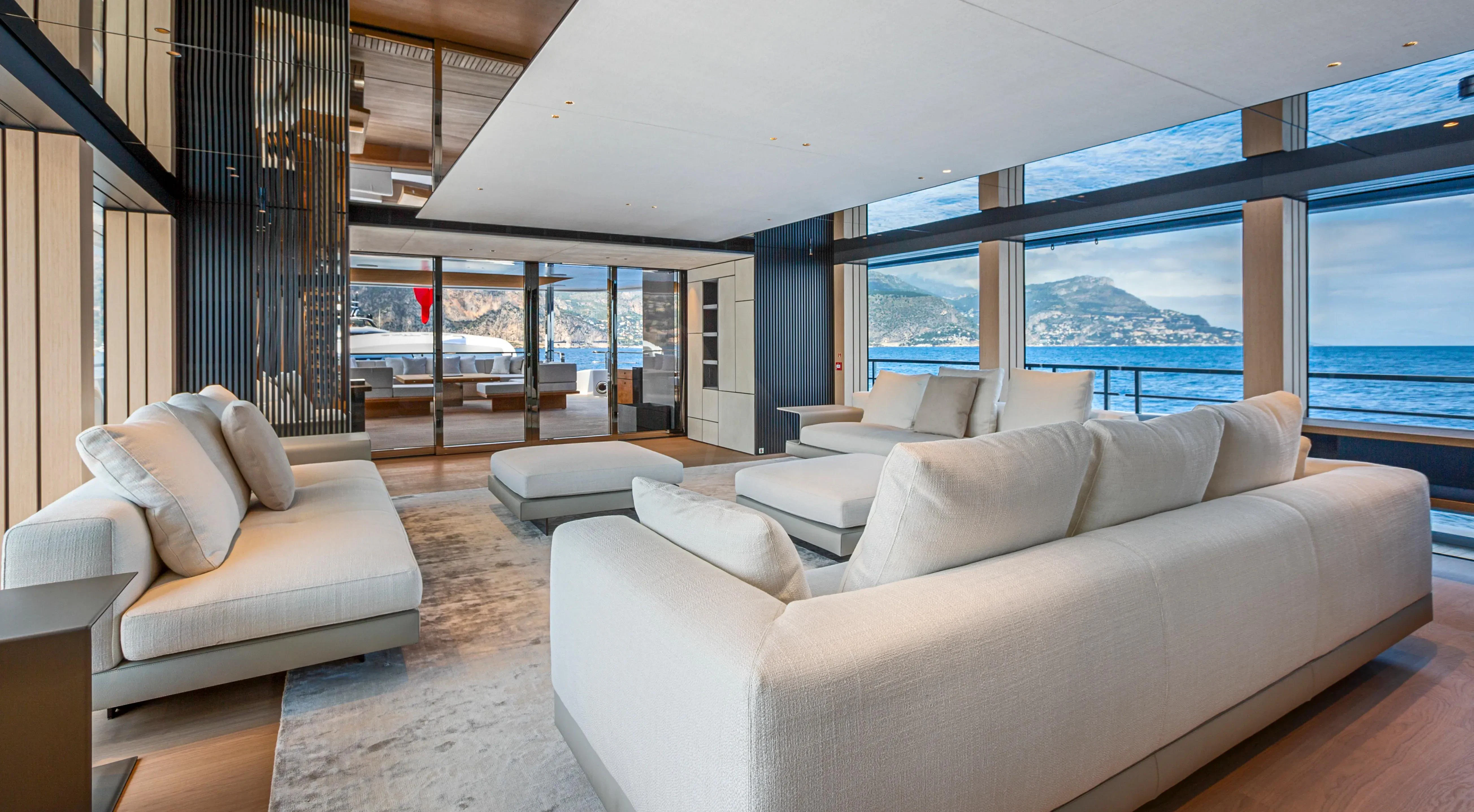 a living room with a large window aboard EXTRA TIME Yacht for Sale