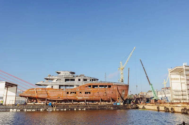 a large building with cranes aboard EXTRA TIME Yacht for Sale