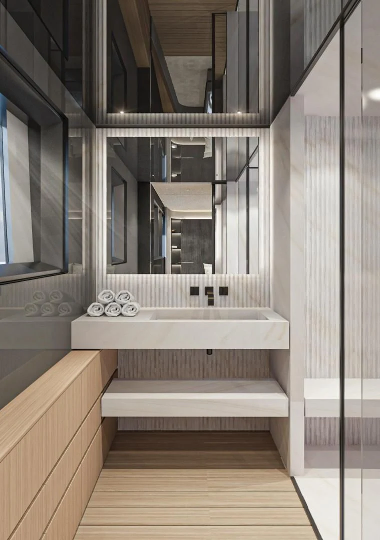 a bathroom with a tub aboard EXTRA TIME Yacht for Sale