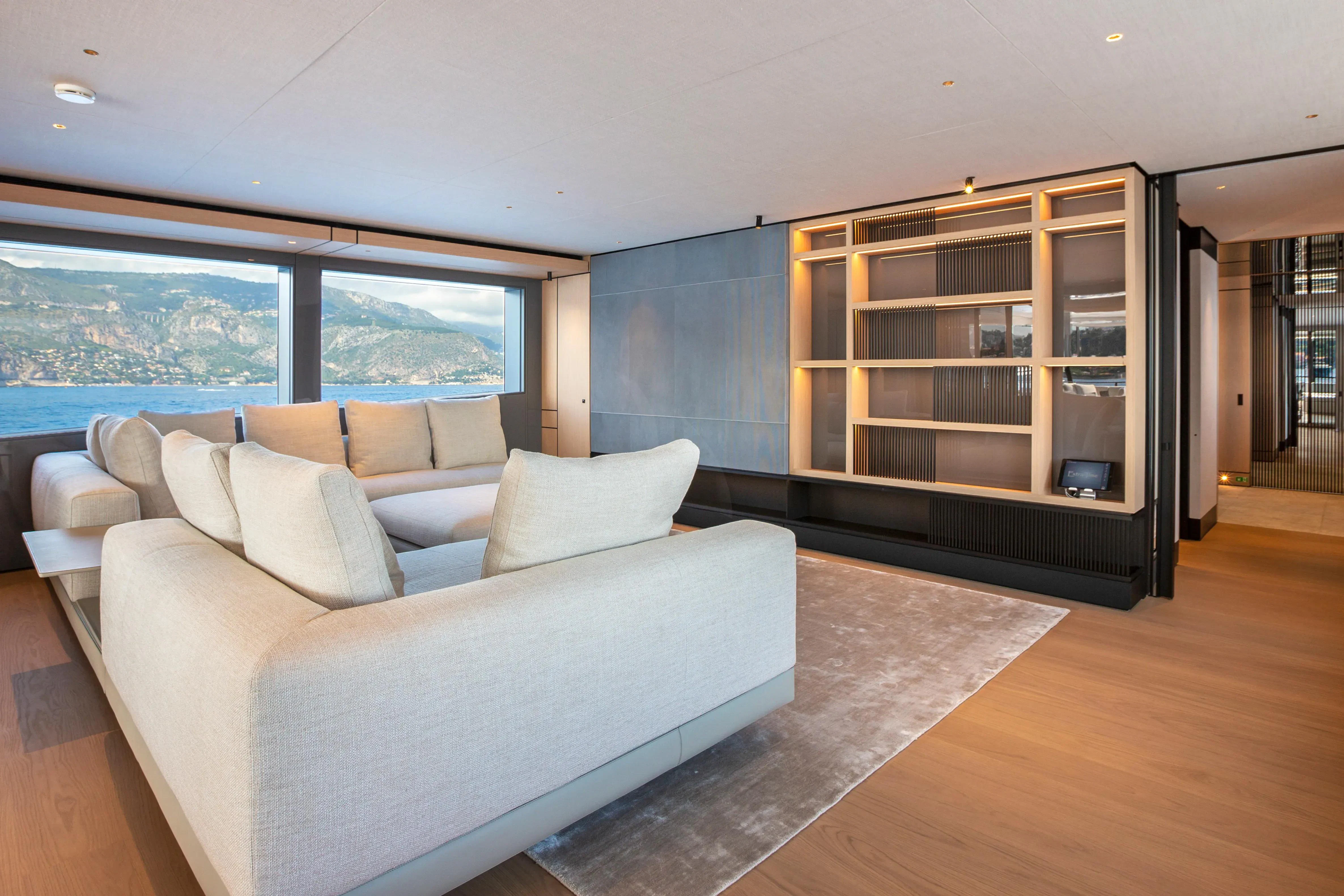 a living room with a large window aboard EXTRA TIME Yacht for Sale