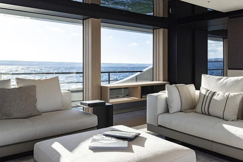 a living room with a large window aboard EXTRA TIME Yacht for Sale