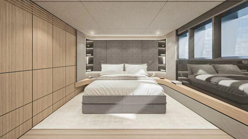 a room with a couple of beds aboard EXTRA TIME Yacht for Sale