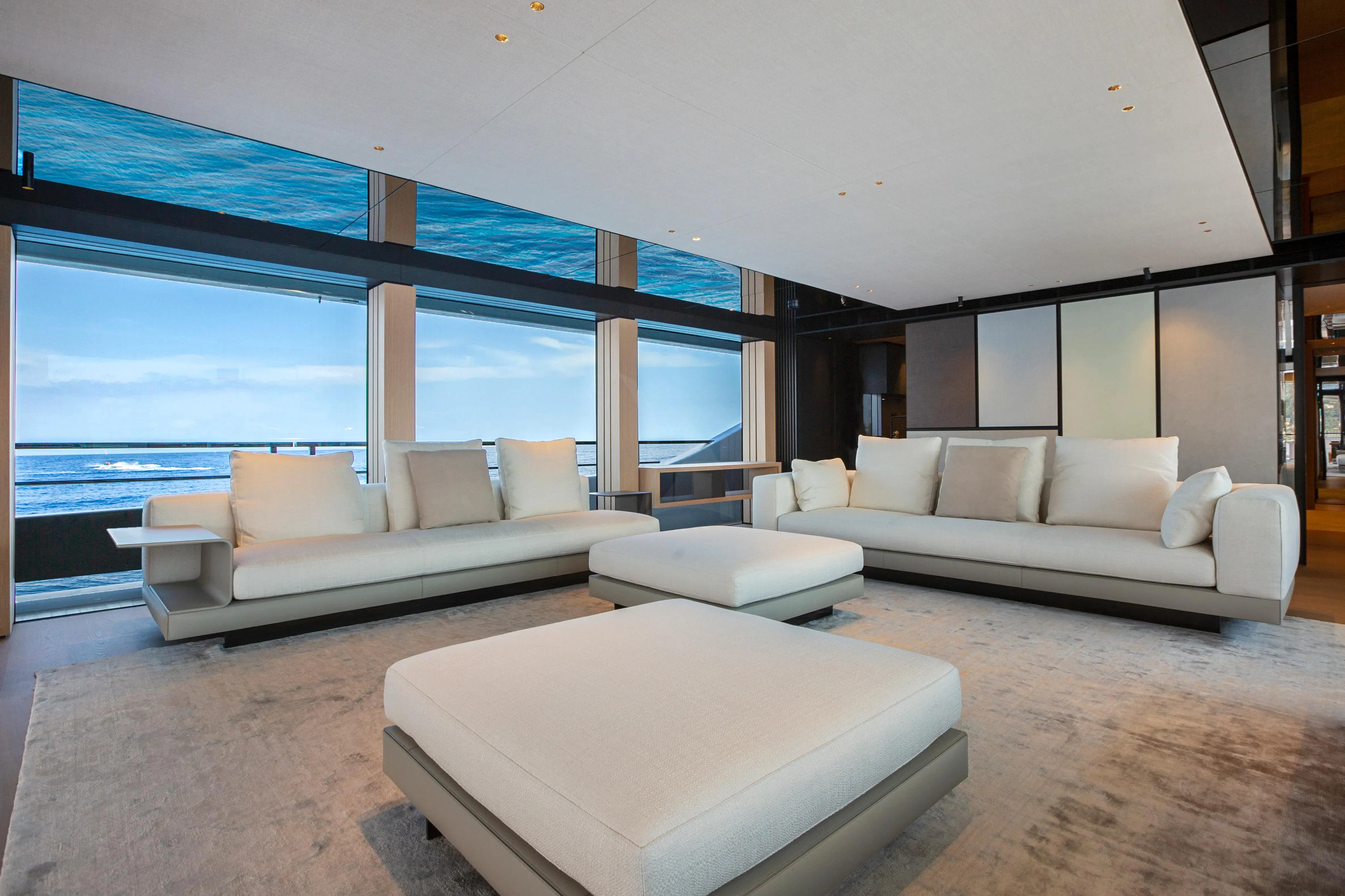 a living room with a large window aboard EXTRA TIME Yacht for Sale