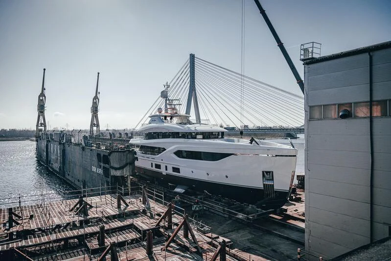 a boat docked at a dock aboard EXTRA TIME Yacht for Sale