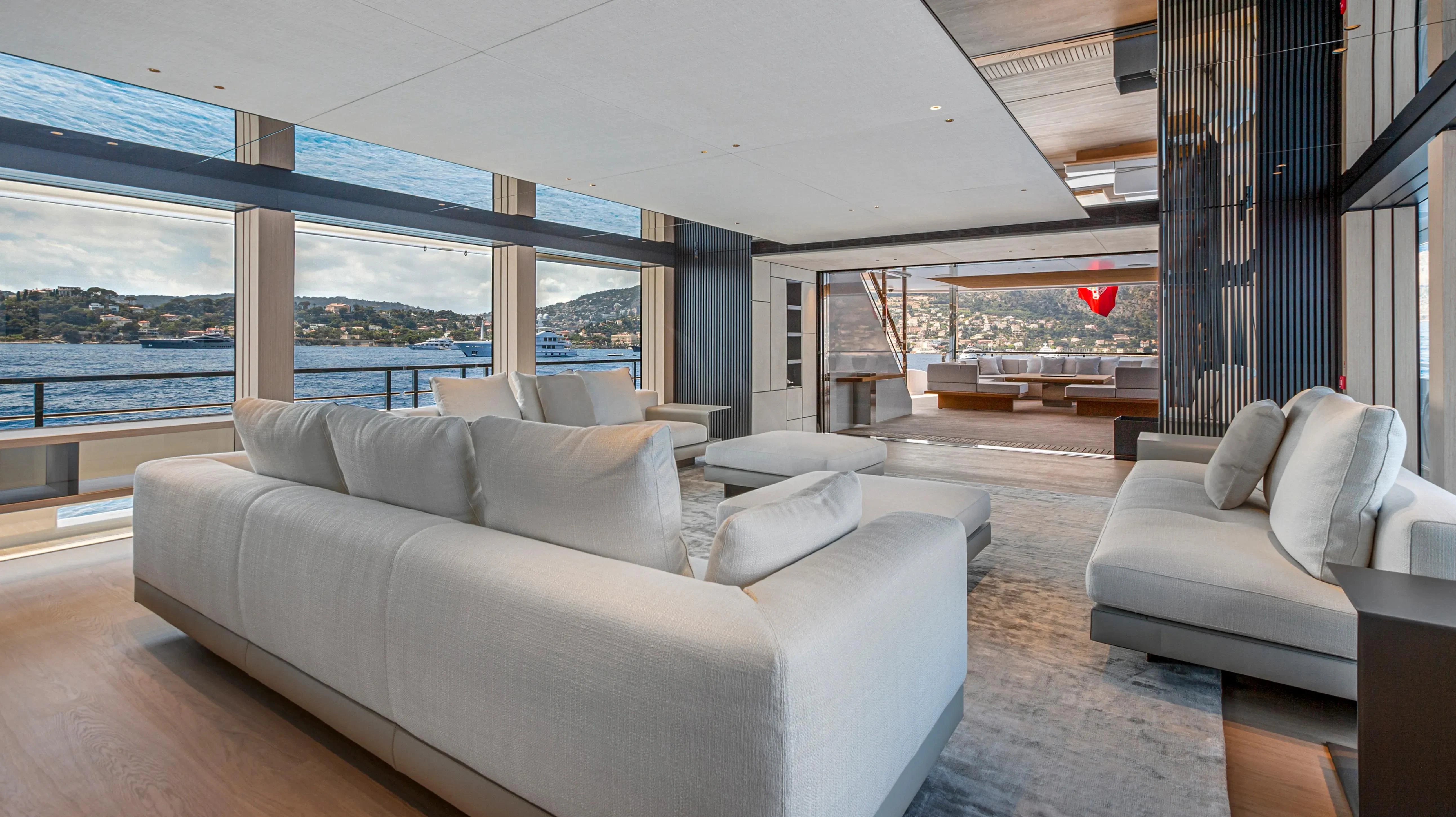 a living room with a large window aboard EXTRA TIME Yacht for Sale