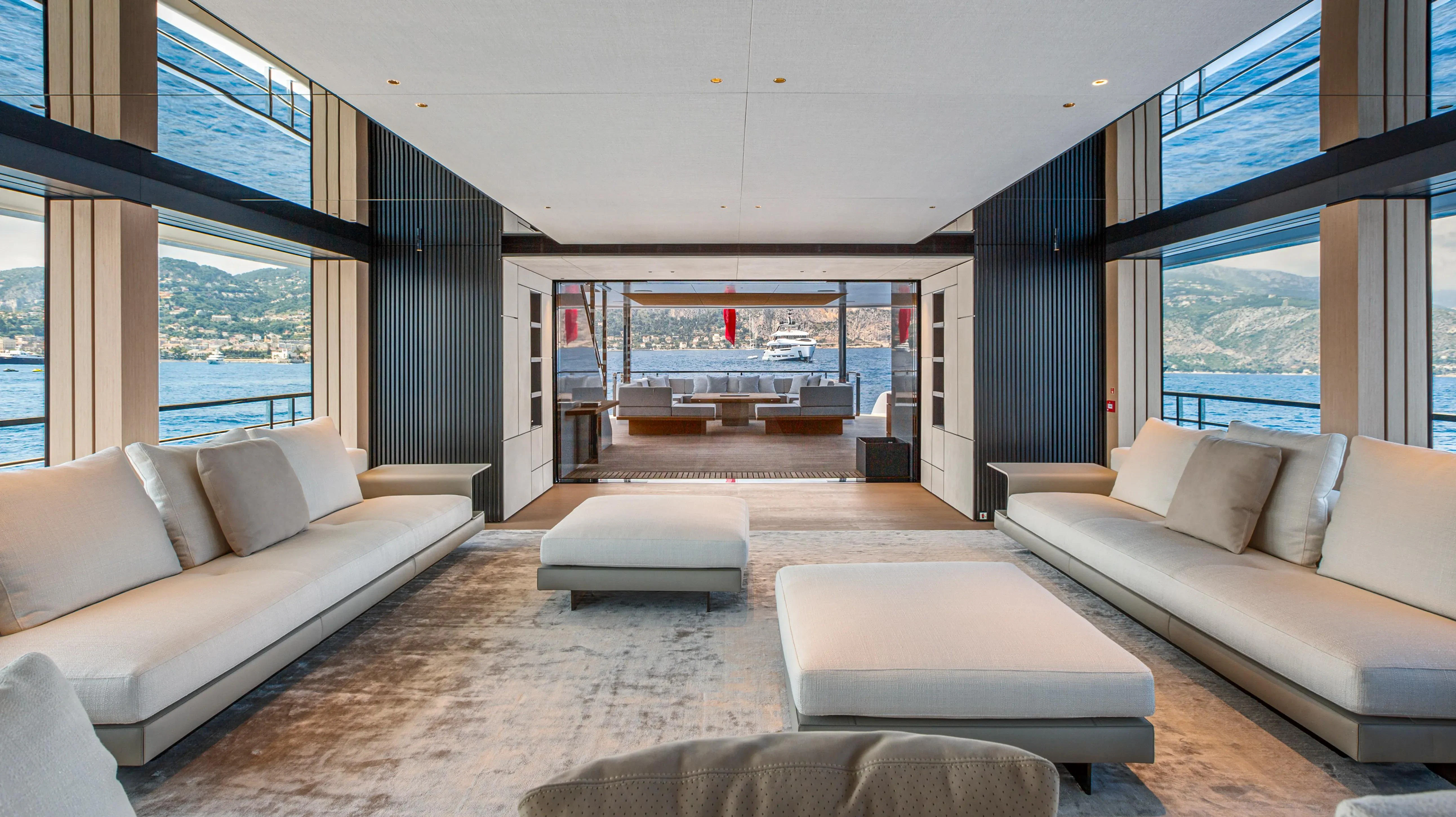 a living room with a large window aboard EXTRA TIME Yacht for Sale
