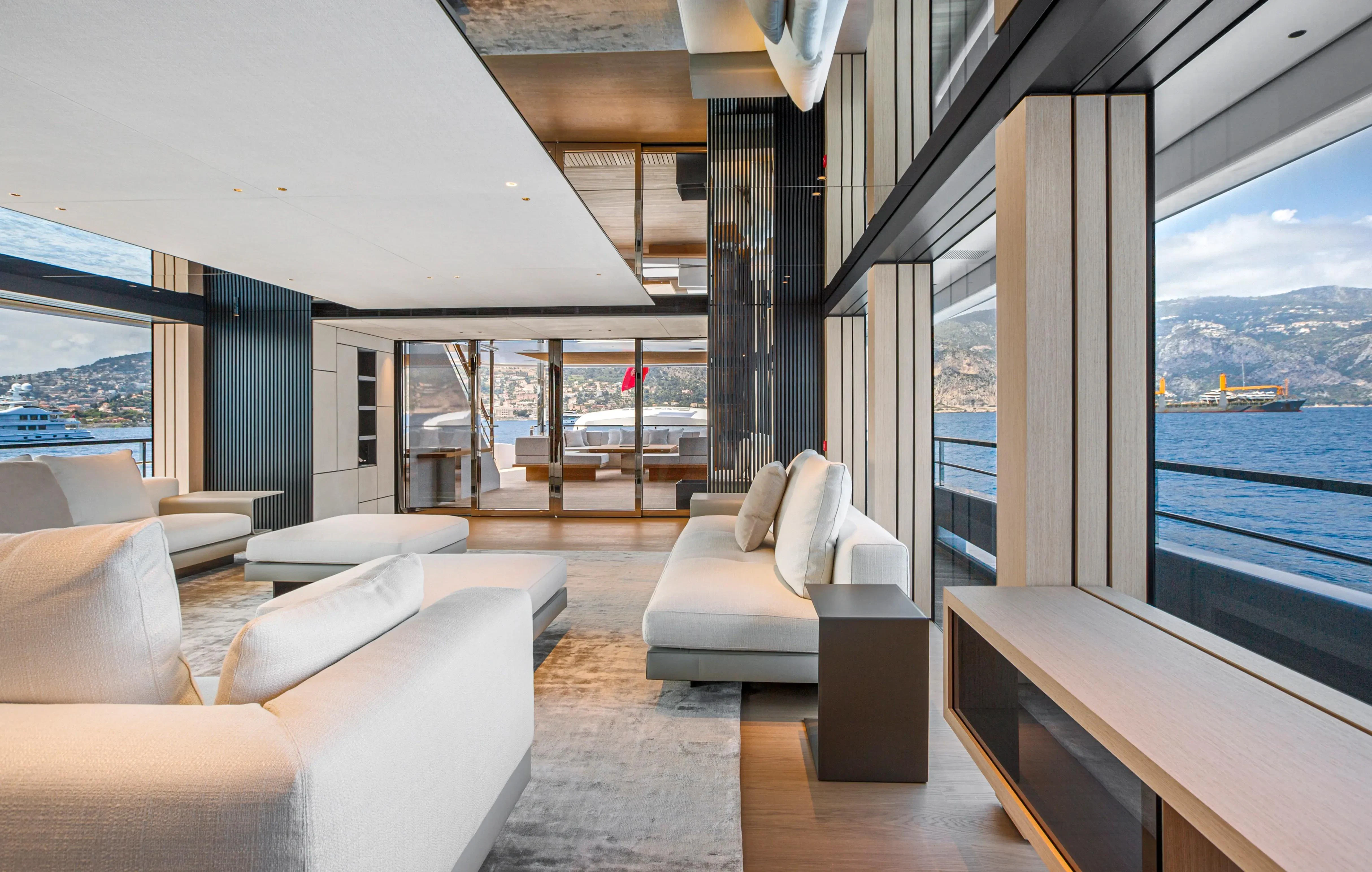 a living room with a large window aboard EXTRA TIME Yacht for Sale