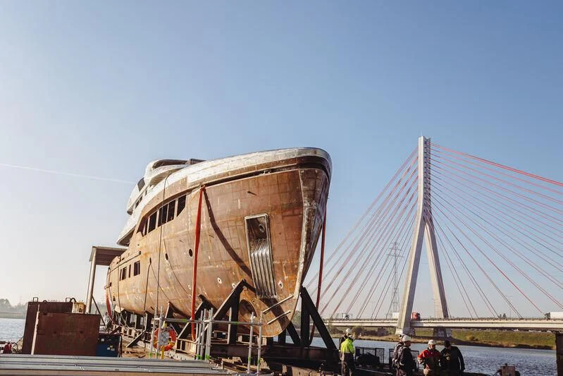 a large container ship aboard EXTRA TIME Yacht for Sale