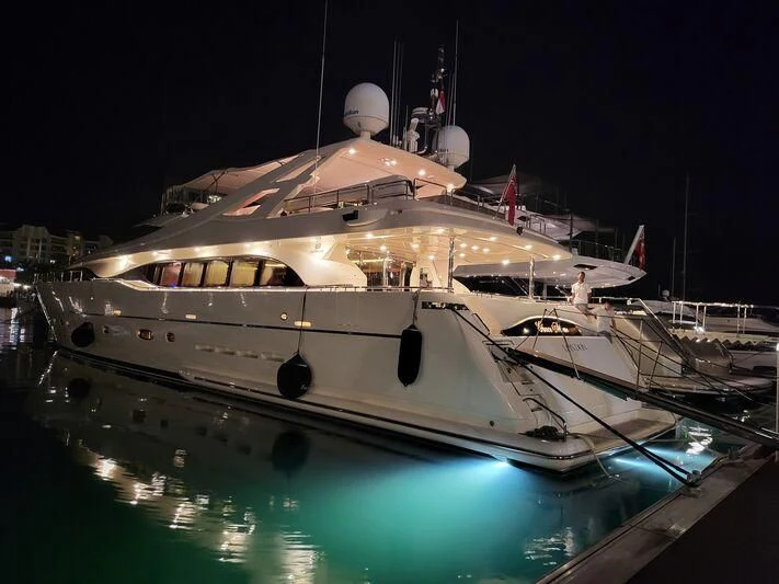 a large white boat in a harbor aboard EAGLE WINGS 3 Yacht for Sale