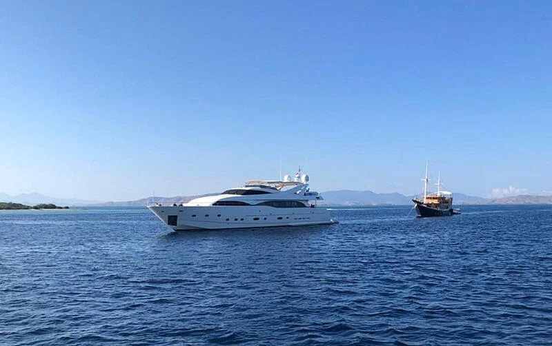 a couple of boats in the water aboard EAGLE WINGS 3 Yacht for Sale