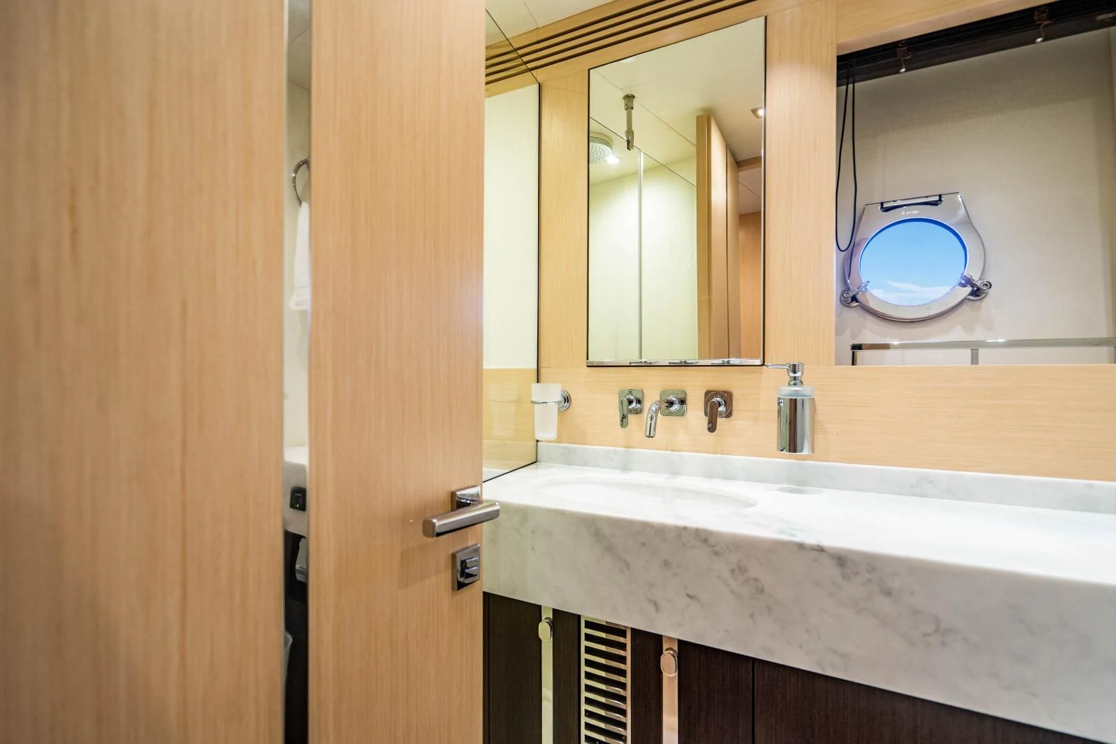 a bathroom with a large mirror aboard SUBMARINO Yacht for Sale