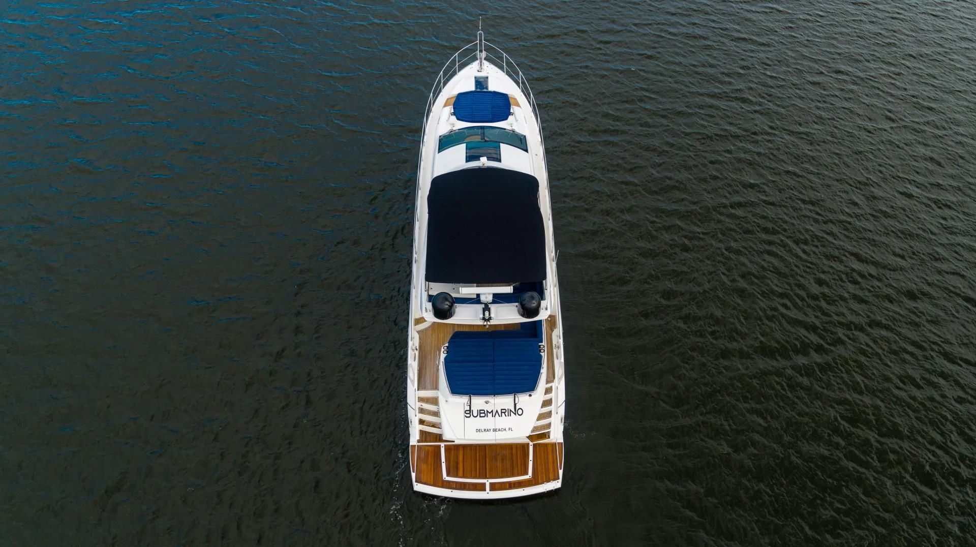 a white and black boat in the water aboard SUBMARINO Yacht for Sale