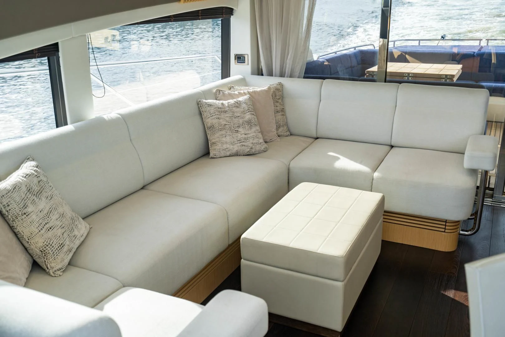 a white couch with pillows aboard SUBMARINO Yacht for Sale