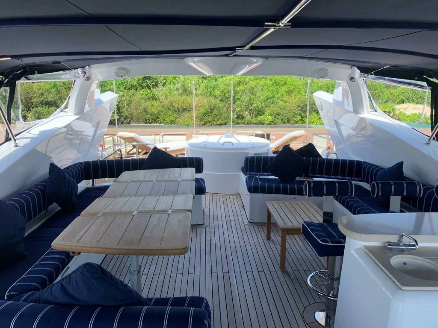 a group of white tents in a tent aboard JULCAN II Yacht for Sale