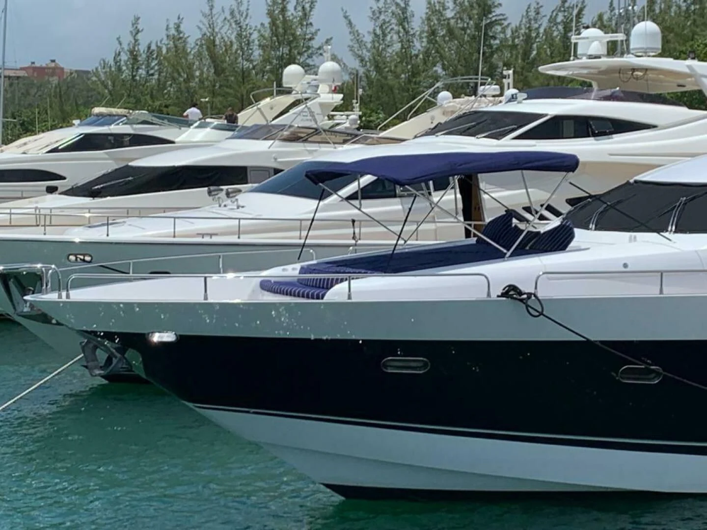a boat parked on the side of a river aboard JULCAN II Yacht for Sale