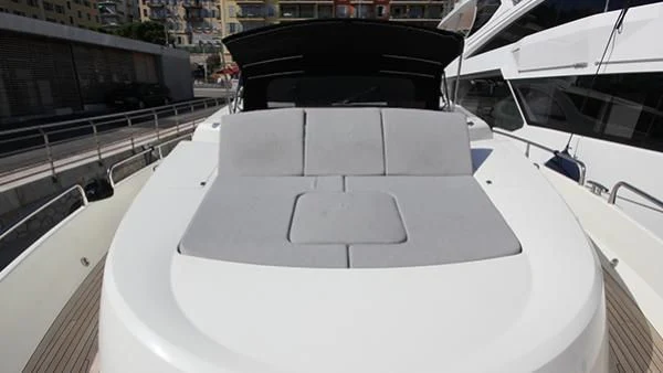 a white car with a black hood aboard BST SUNRISE Yacht for Sale