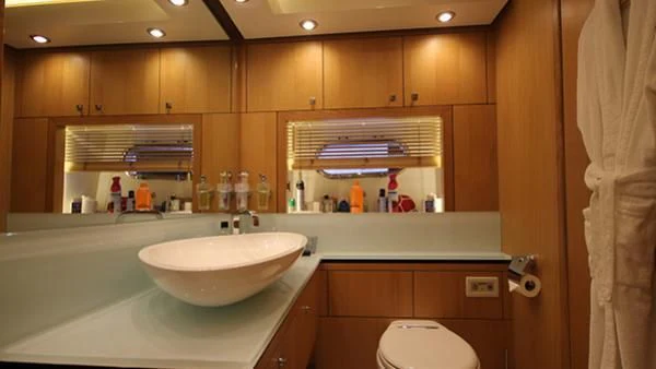 a bathroom with a sink and a toilet aboard BST SUNRISE Yacht for Sale