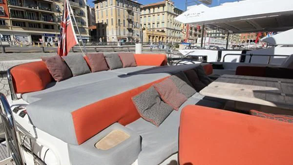 a boat with red and white pillows aboard BST SUNRISE Yacht for Sale