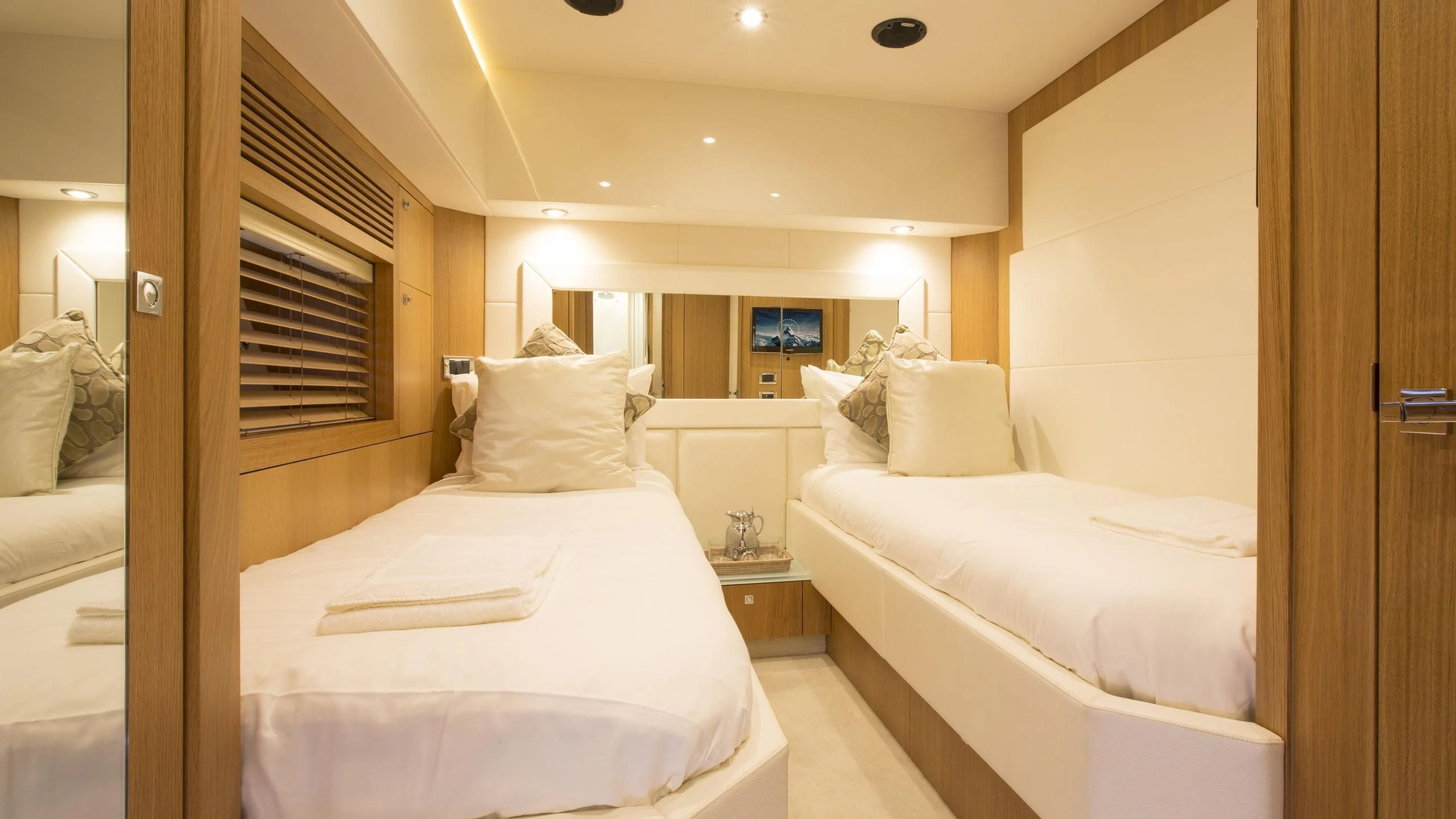 a room with two beds aboard BST SUNRISE Yacht for Sale
