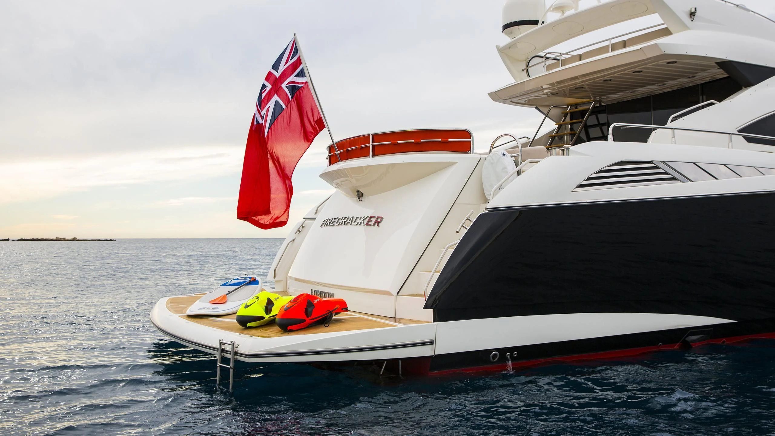 a boat with a flag on the front aboard BST SUNRISE Yacht for Sale