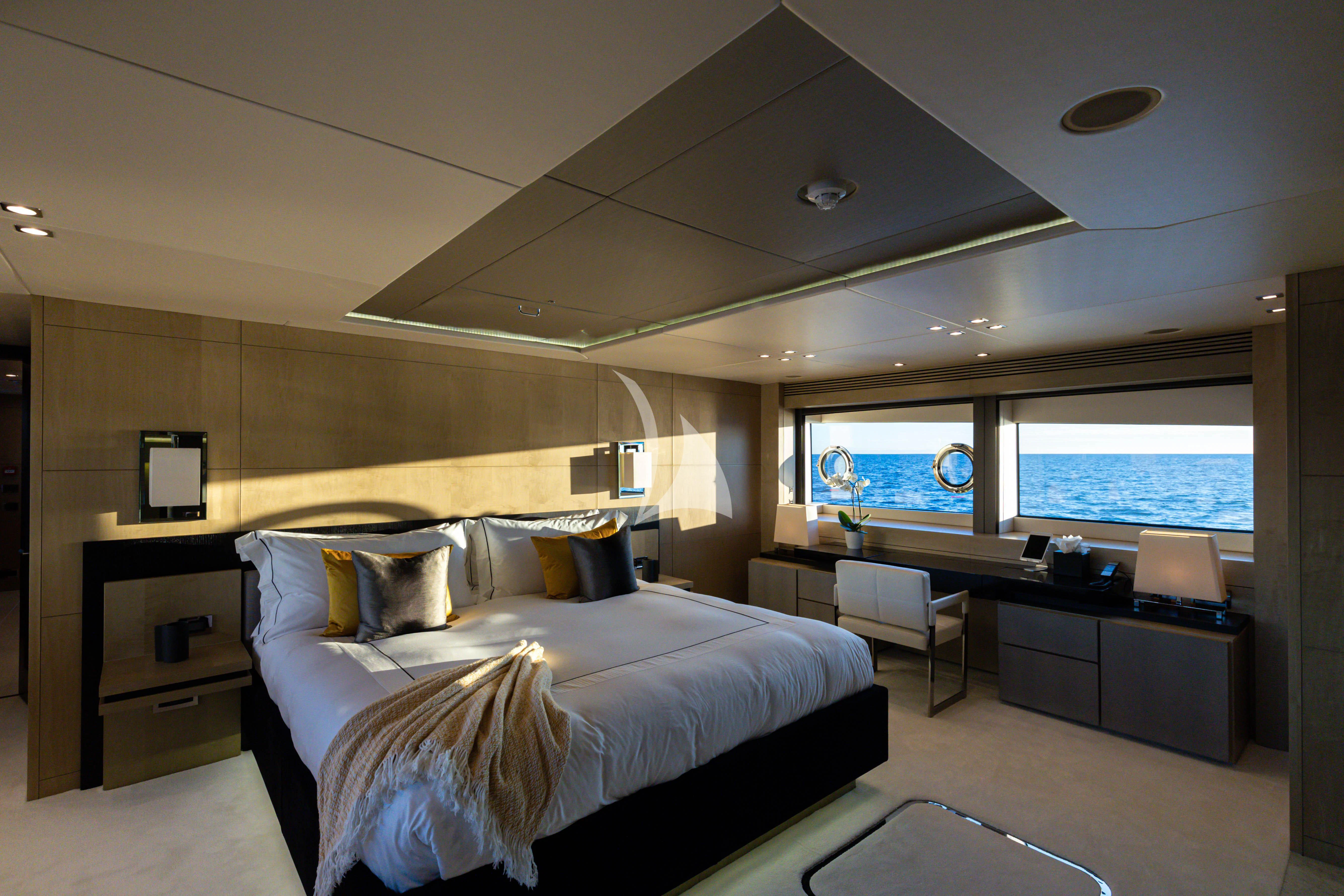 a bedroom with a large bed aboard OKSANCHIK Yacht for Charter