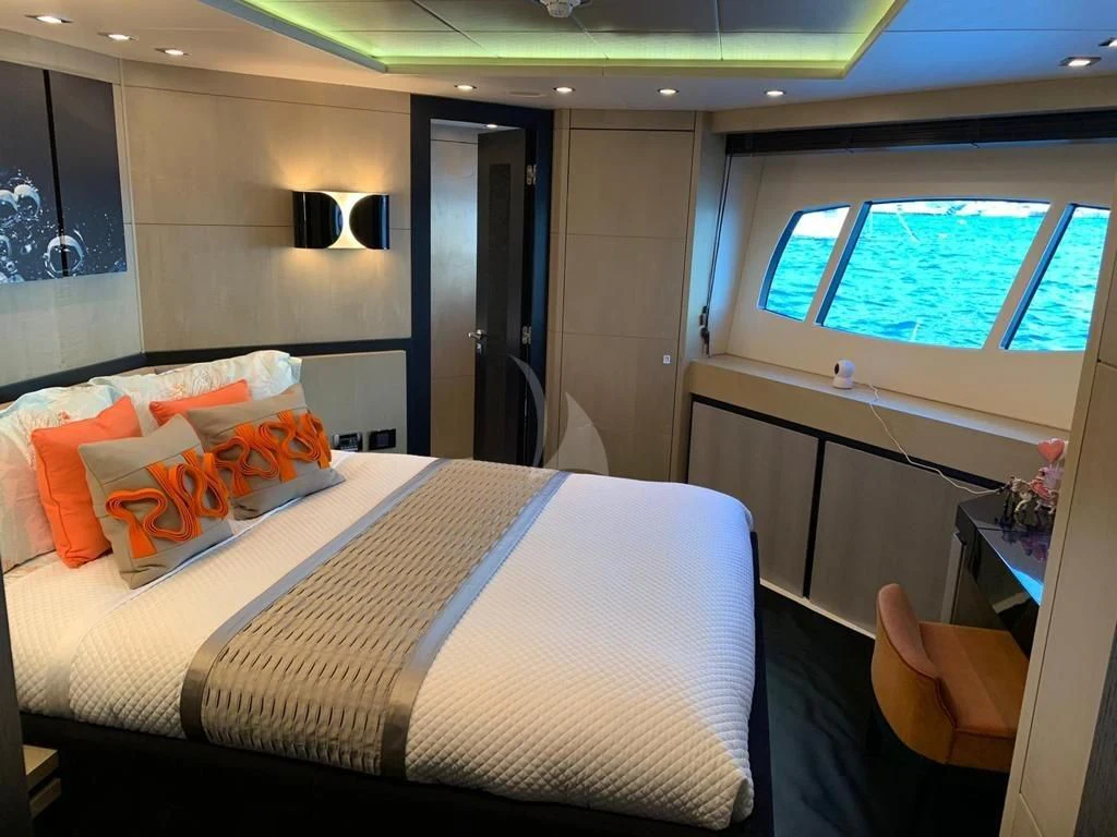 a bed in a room aboard OKSANCHIK Yacht for Charter