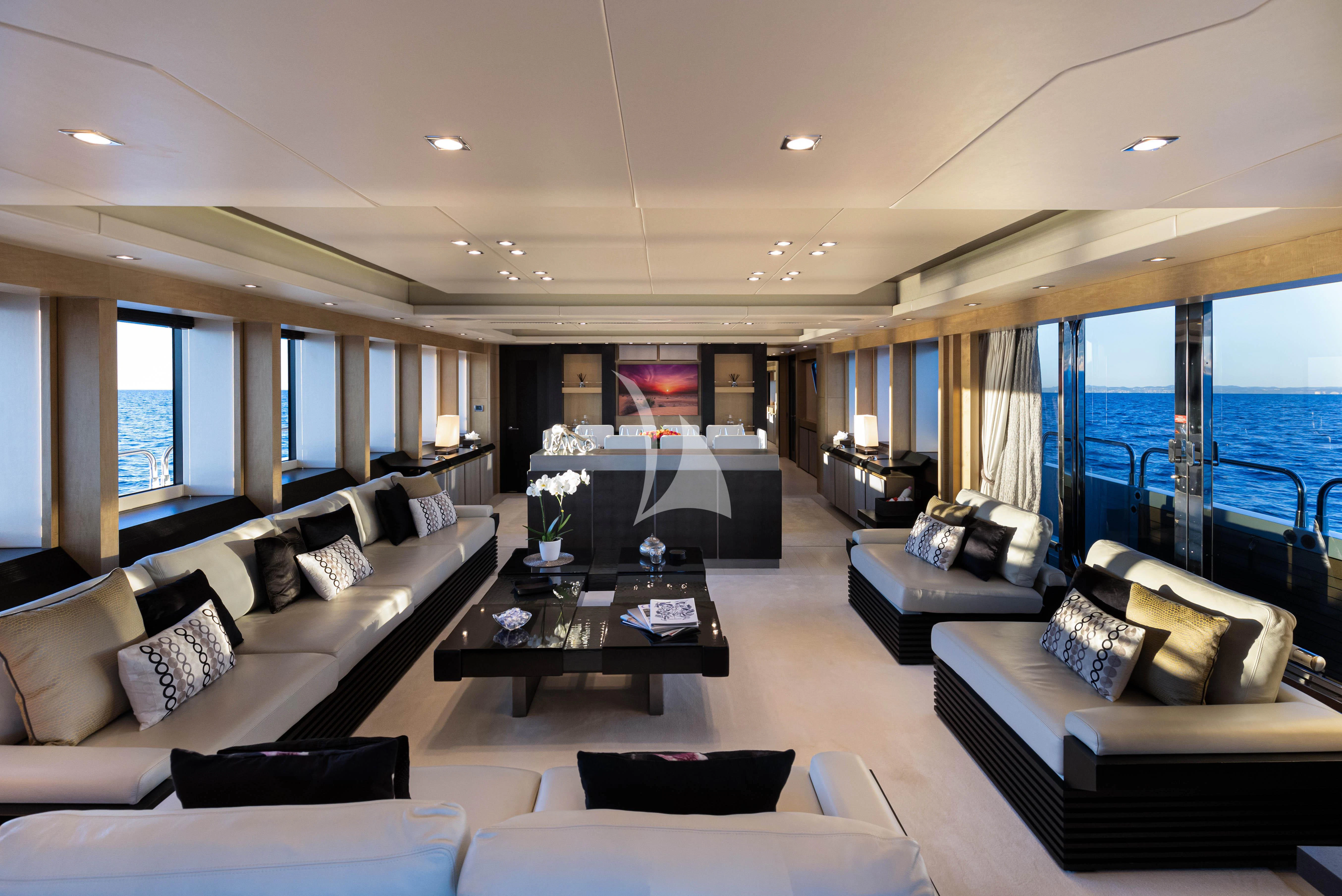 a living room with a large window aboard OKSANCHIK Yacht for Charter
