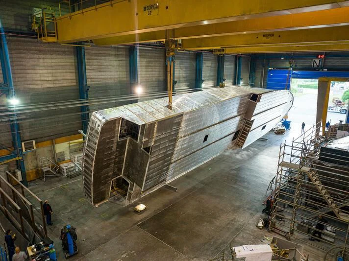 a large factory with several people aboard ARAOK II Yacht for Sale