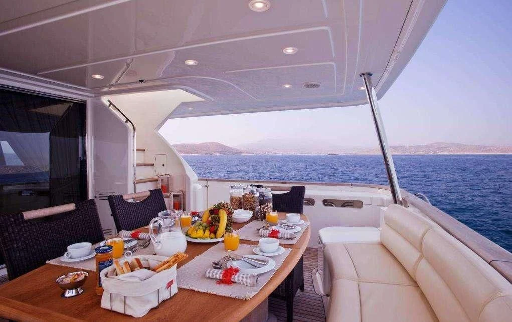 a table with food on it aboard DANA Yacht for Sale