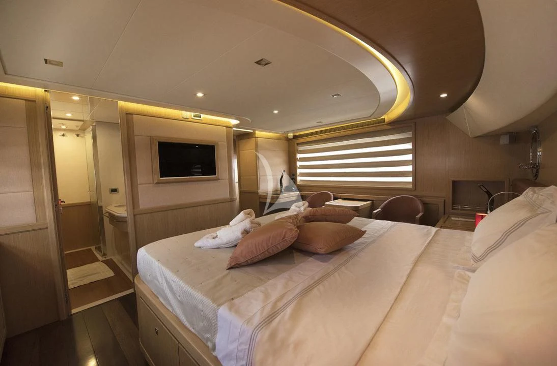 a bed in a room aboard DANA Yacht for Sale