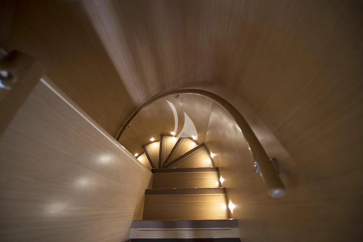 a staircase with lights aboard DANA Yacht for Sale