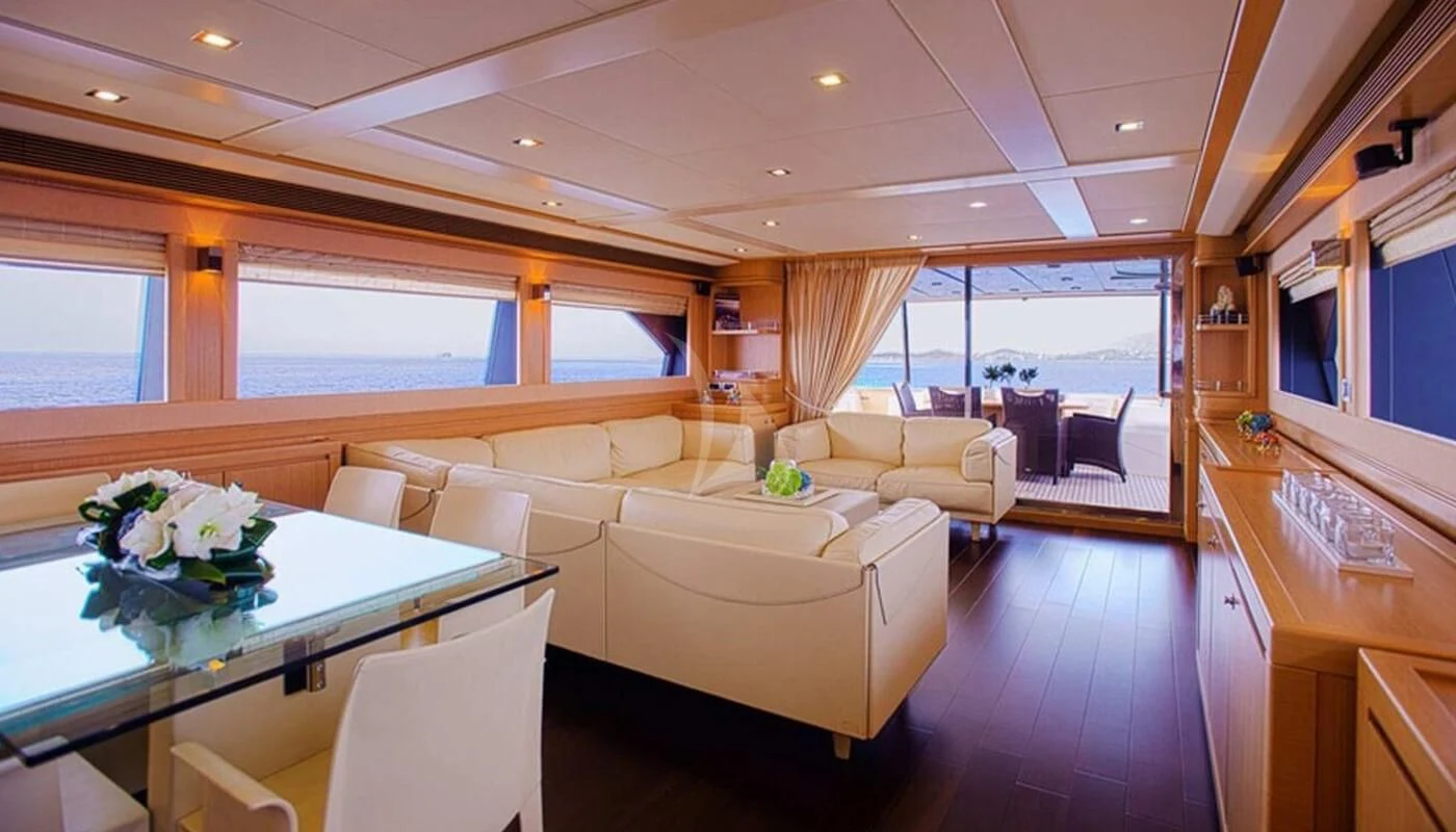 a living room with a large window aboard DANA Yacht for Sale