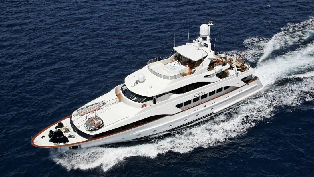 a white boat on the water aboard SATINE Yacht for Sale